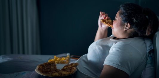 A girl eating in night