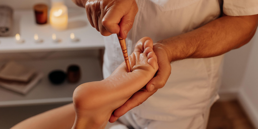 foot massage with marma wand