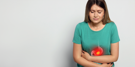 Lady holding stomach