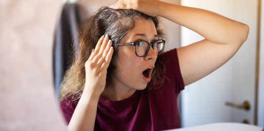 girl worried about her grey hair 