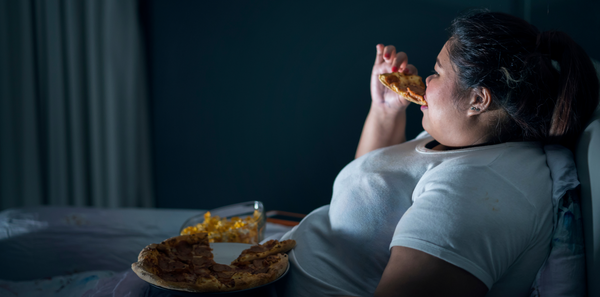 A girl eating in night 